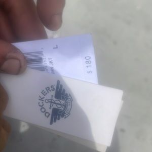 A large brown dockers leather jacket 180$ tag . I want 140$